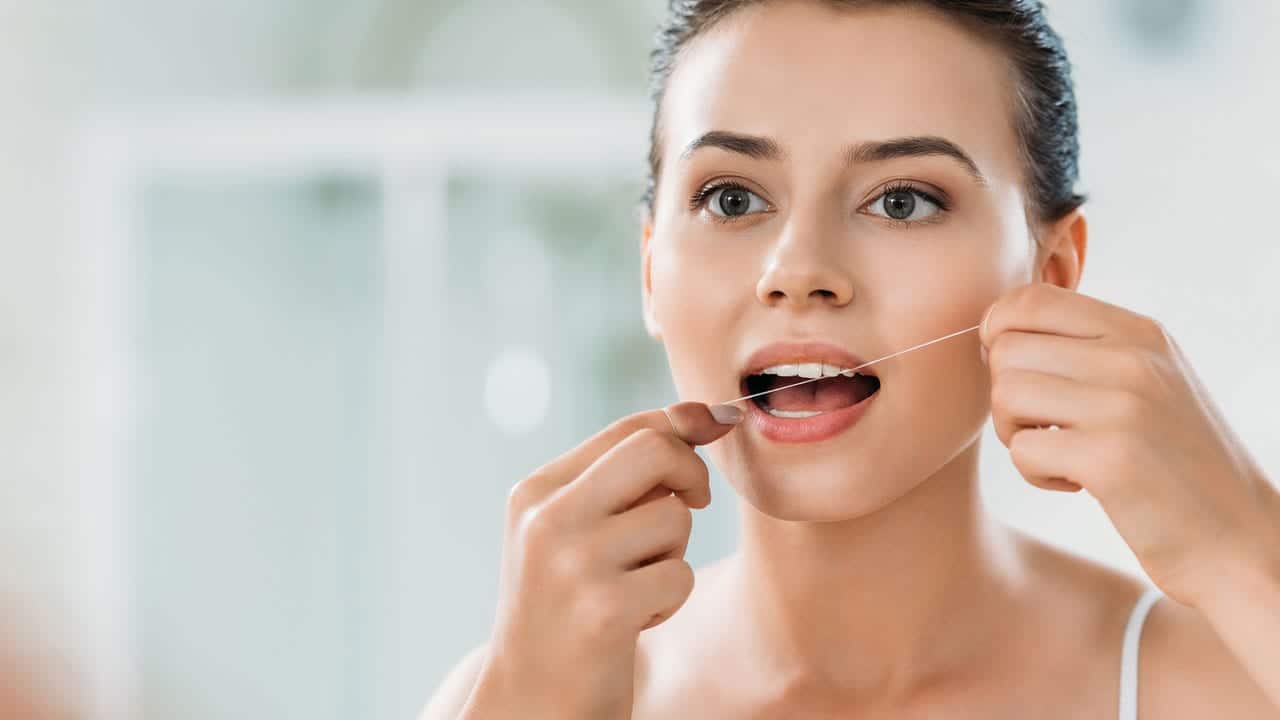 The Link Between Poor Flossing and Gum Disease Brighton